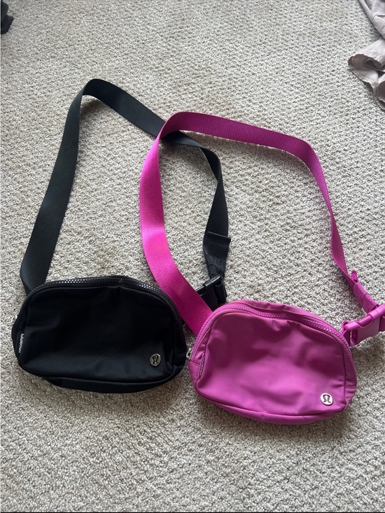 lululemon athletica Handbags - lululemon athletica Black and Bright Pink Crossbody Belt Bags